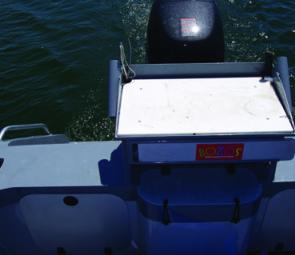 There’s tackle storage behind the sliding door under the bait board and heaps more storage in the transom – batteries are under the console. The centre plumbed live-bait tank is 60L.